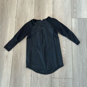 Black Lululemon quarter sleeved, quarter zip shirt